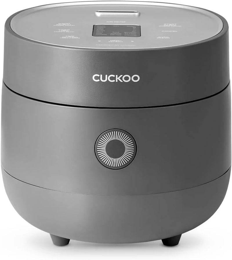Electric rice cooker with 6-cup capacity (uncooked) / 12-cup capacity (cooked), modern fuzzy logic control, featuring timer function and insulation setting, compact model, multi-functional steamer, non-stick inner liner, gray exterior. N7834